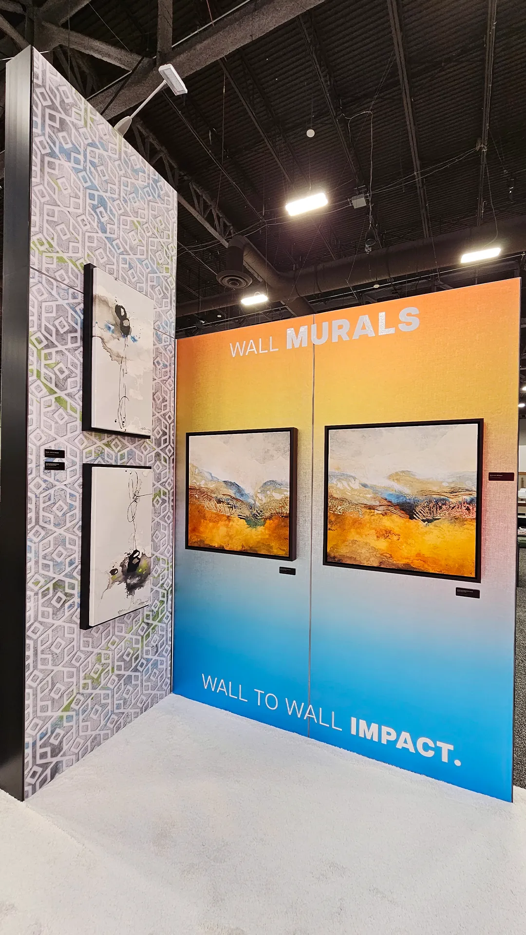 Wall mural display featuring large-format printed artwork, textured wall graphics, and framed art panels at the Image Craft trade show booth.