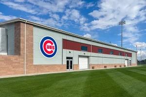 Chicago Cubs Sloan Park training facility exterior with custom dimensional team logo signage