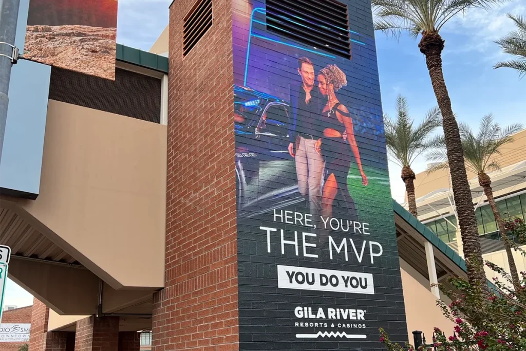 Gila River Resorts & Casinos exterior wall graphic installed on a brick building facade