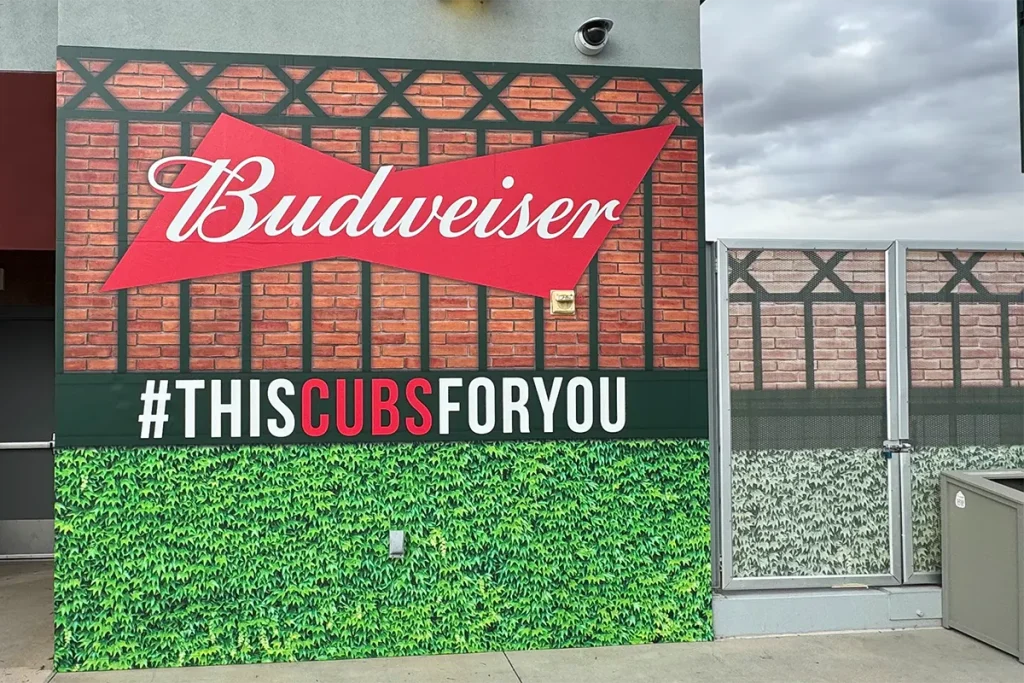 Budweiser and Chicago Cubs branded exterior wall graphics with brick and ivy design