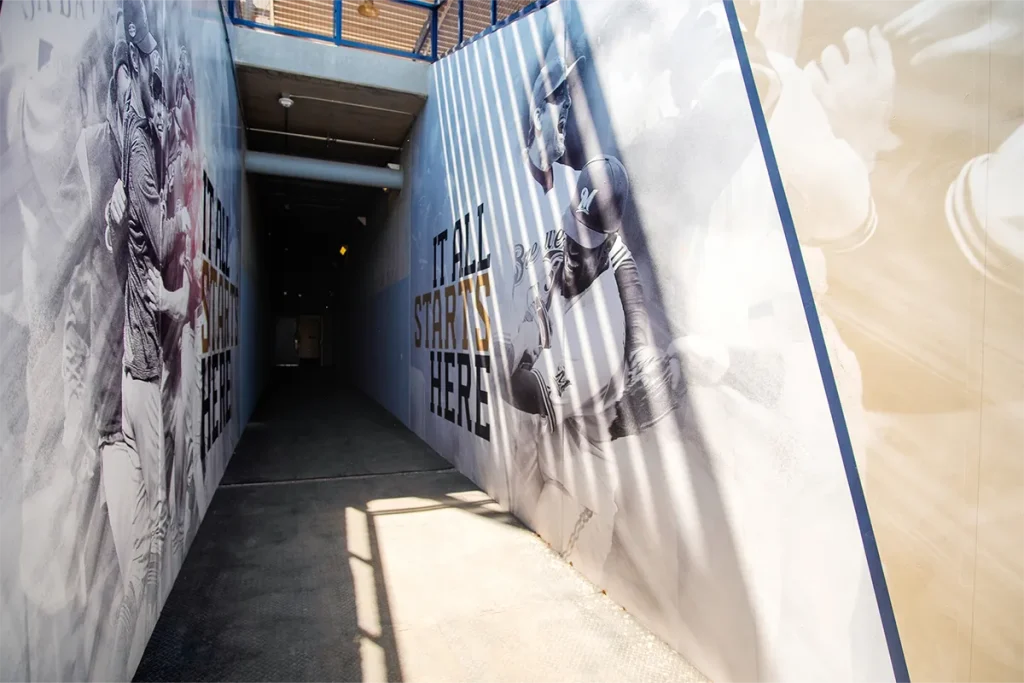 Milwaukee Brewers player wall graphics installed throughout a stadium walkway